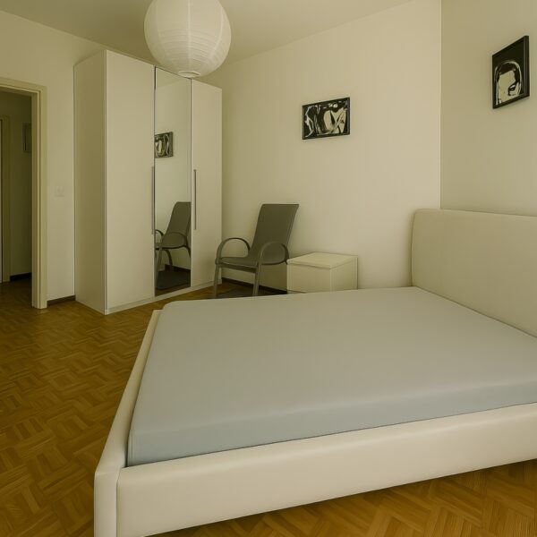 8 Vendiamo appartamento Massagno - camera